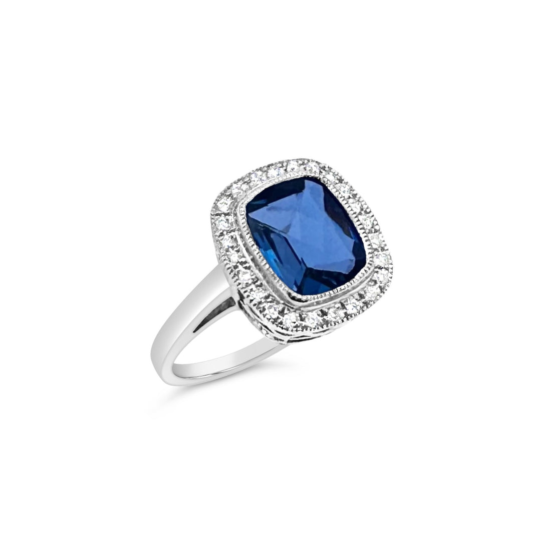 14K White Gold Light Blue Topaz Ring